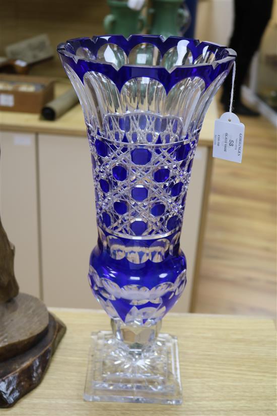 A large blue overlaid cut glass vase height 41cm